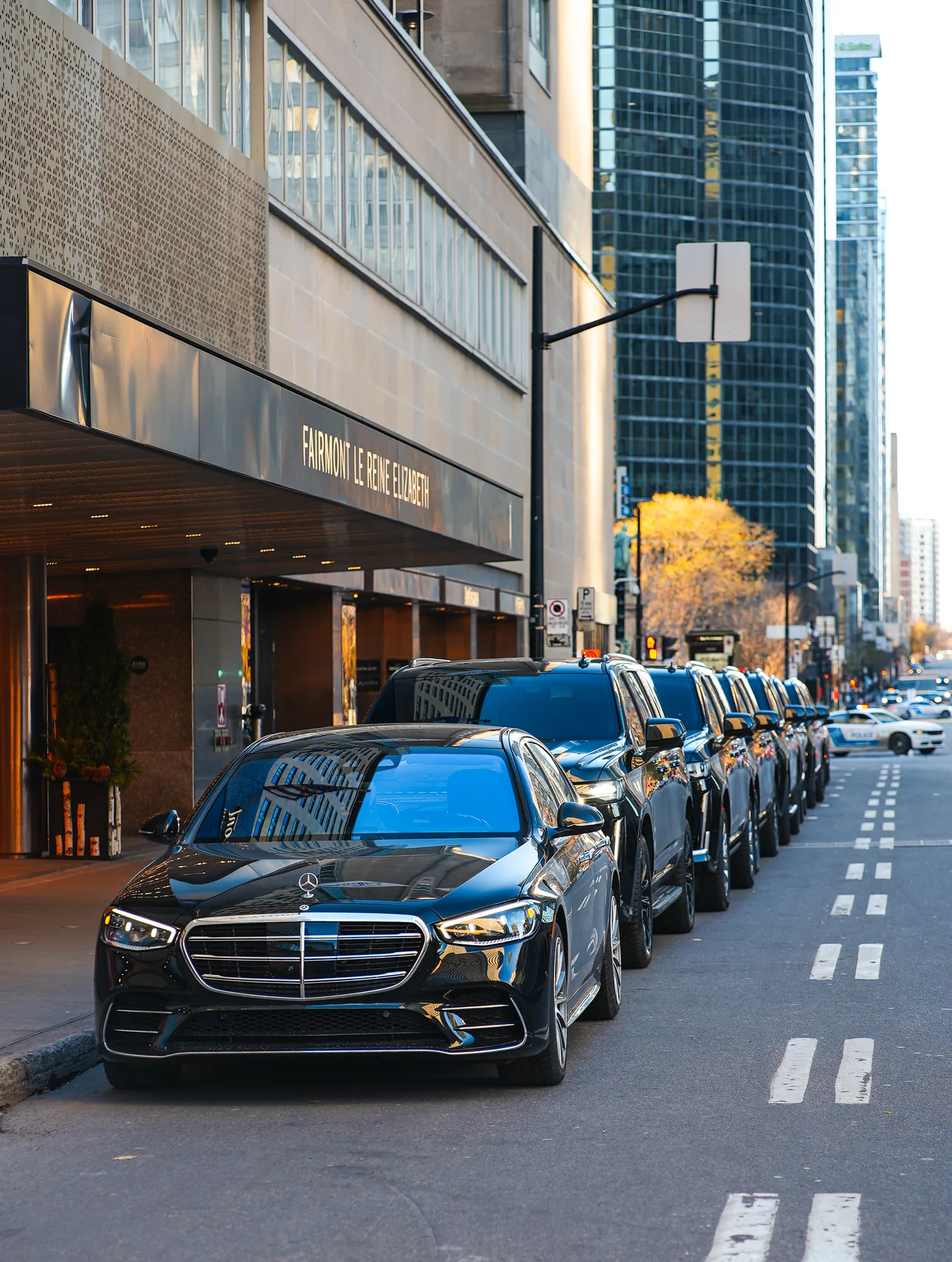Mercedes sedan and SUV lineup outside Fairmont The Queen Elizabeth.